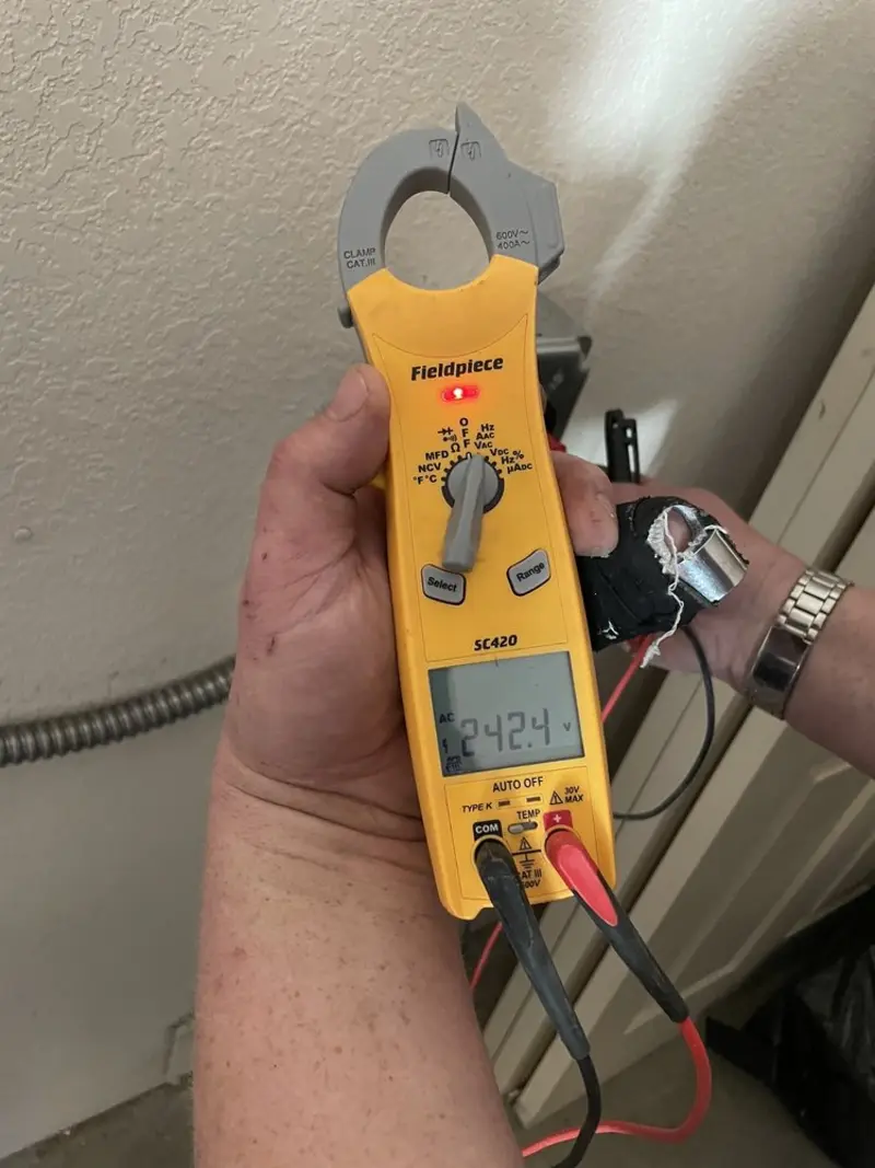 Voltage testing with clamp meter during Circuit Breaker Repair in Polson